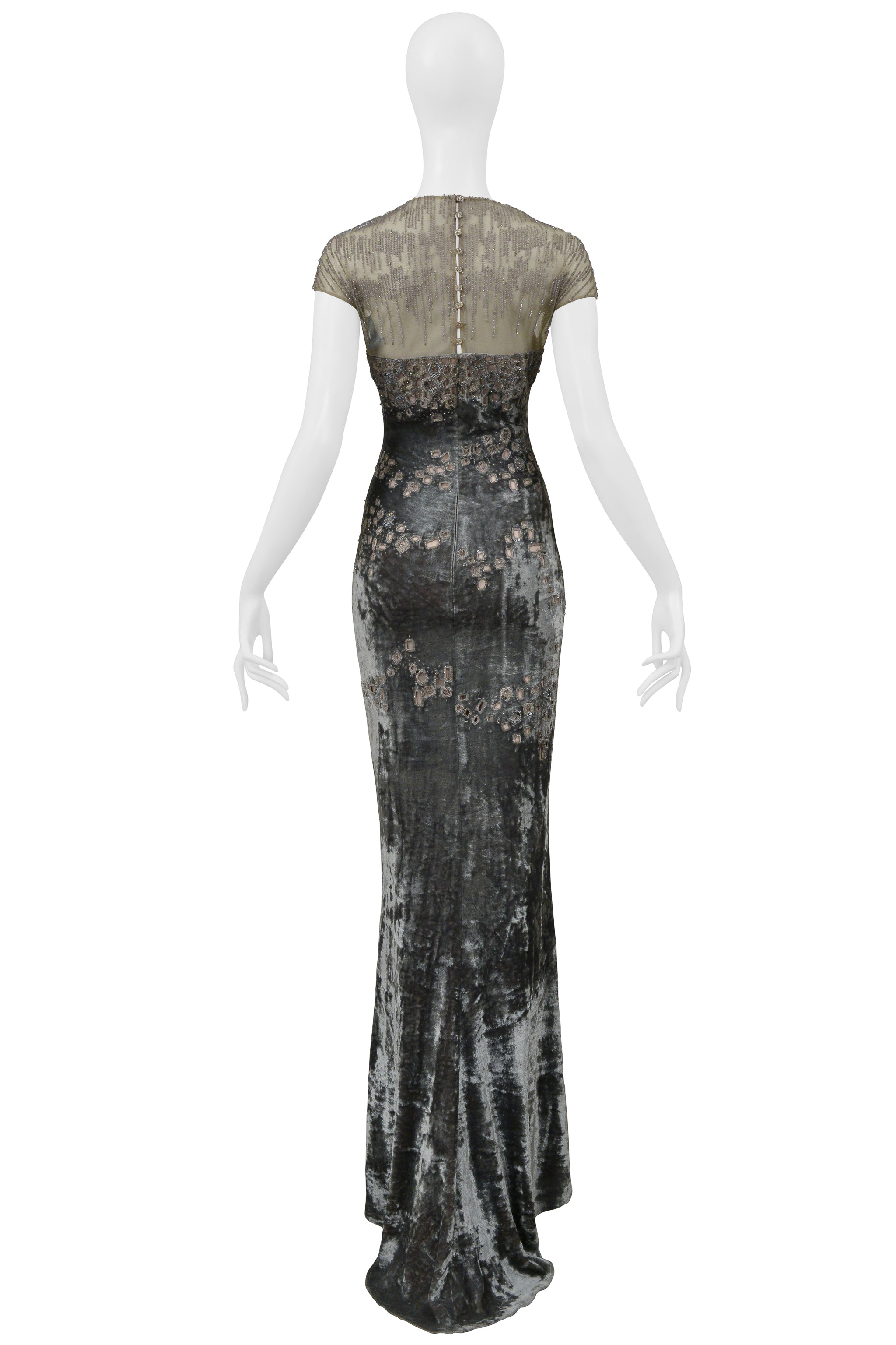 BADGLEY MISCHKA SILVER EVENING GOWN WITH MESH YOKE, BEADING, AND SQUARE CUTOUTS