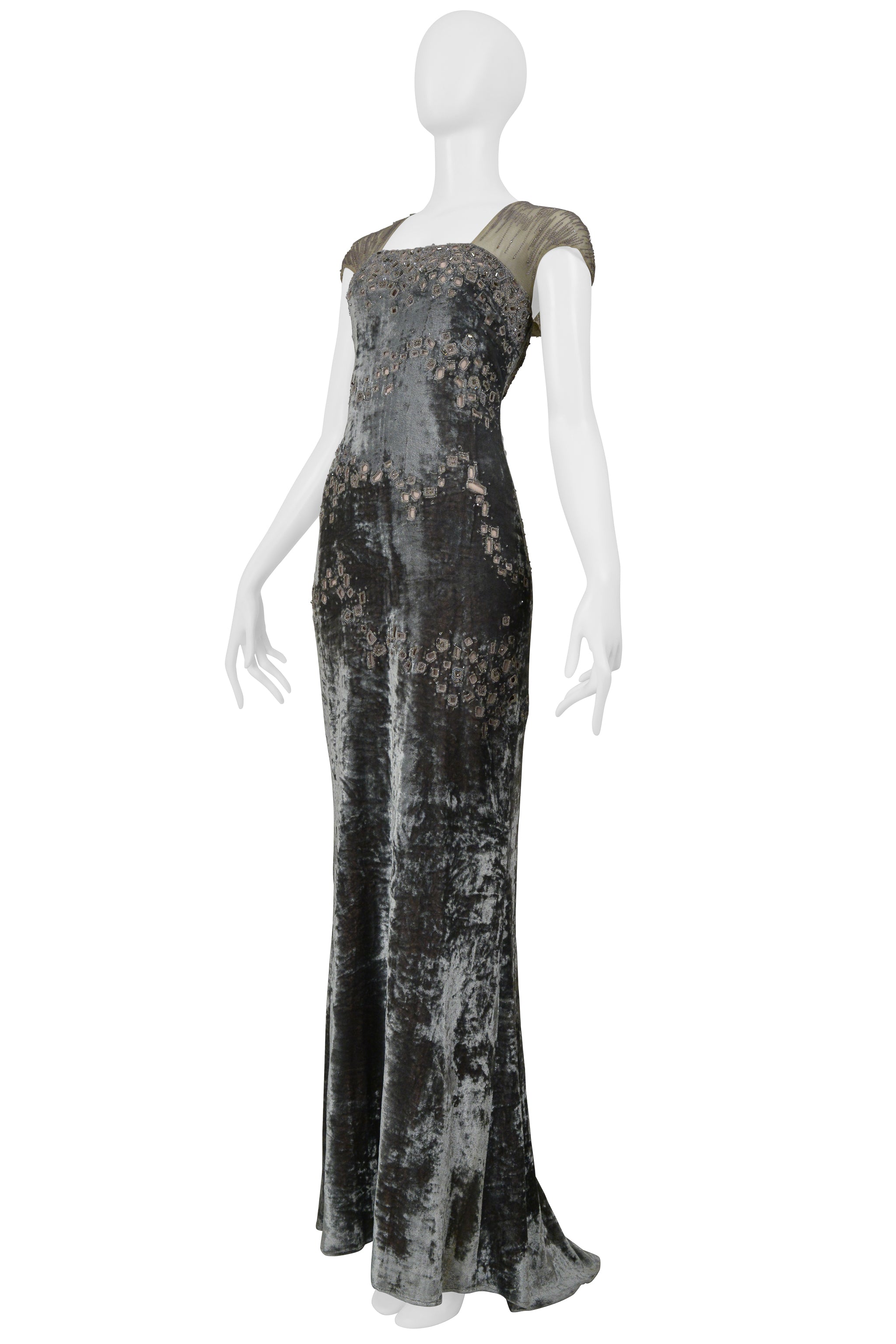 BADGLEY MISCHKA SILVER EVENING GOWN WITH MESH YOKE, BEADING, AND SQUARE CUTOUTS