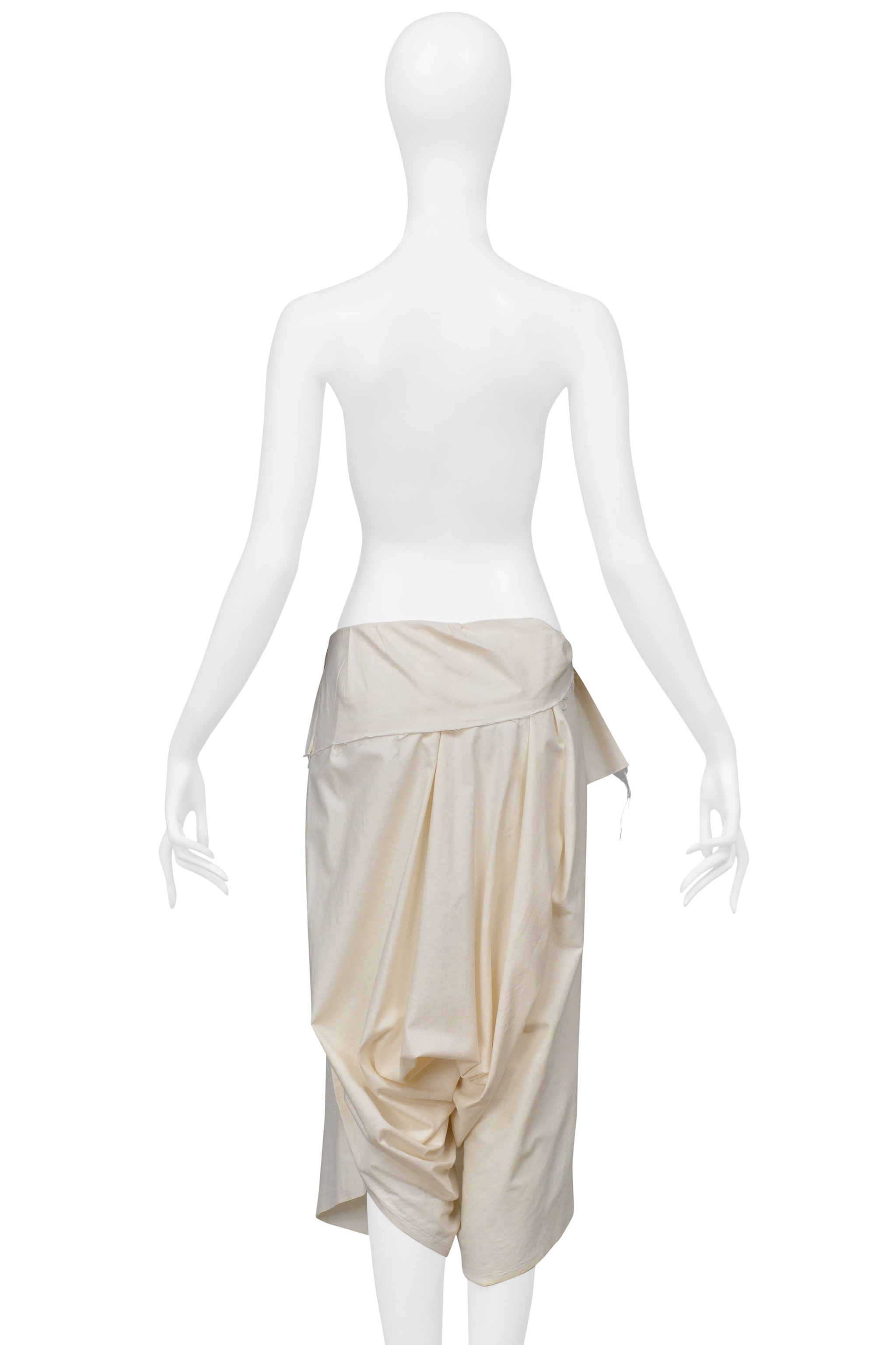 COMME DES GARÇONS CREAM OVERSIZED DRAPED SHORTS