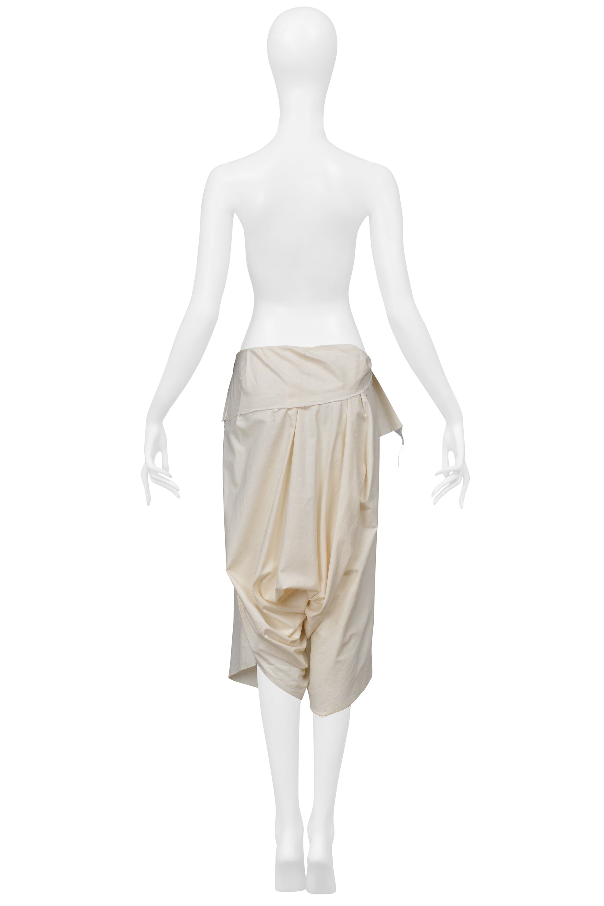 COMME DES GARÇONS CREAM OVERSIZED DRAPED SHORTS
