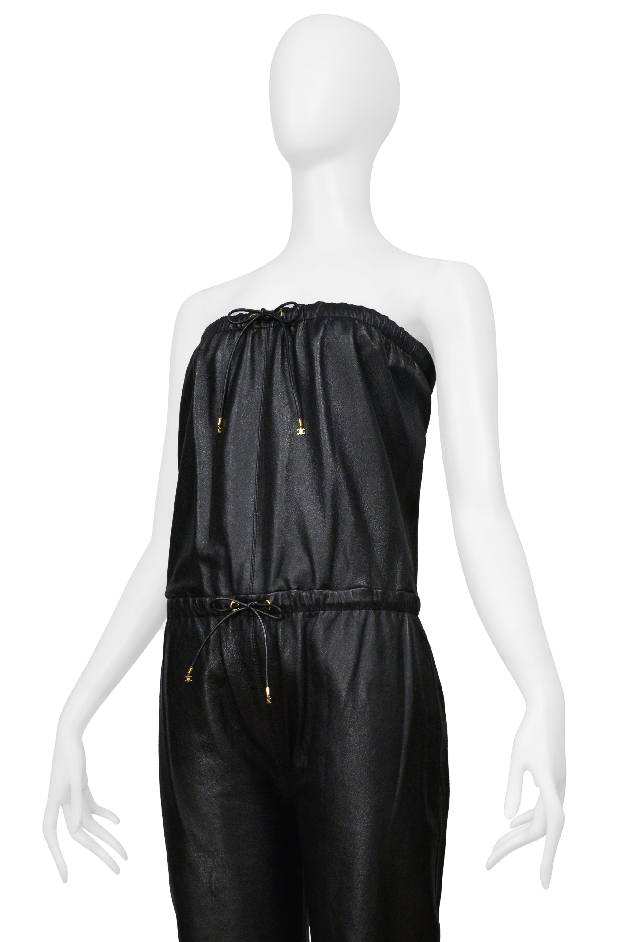 CELINE BY HEDI SLIMANE BLACK LEATHER STRAPLESS JUMPSUIT WITH GOLD DETAILING 2021