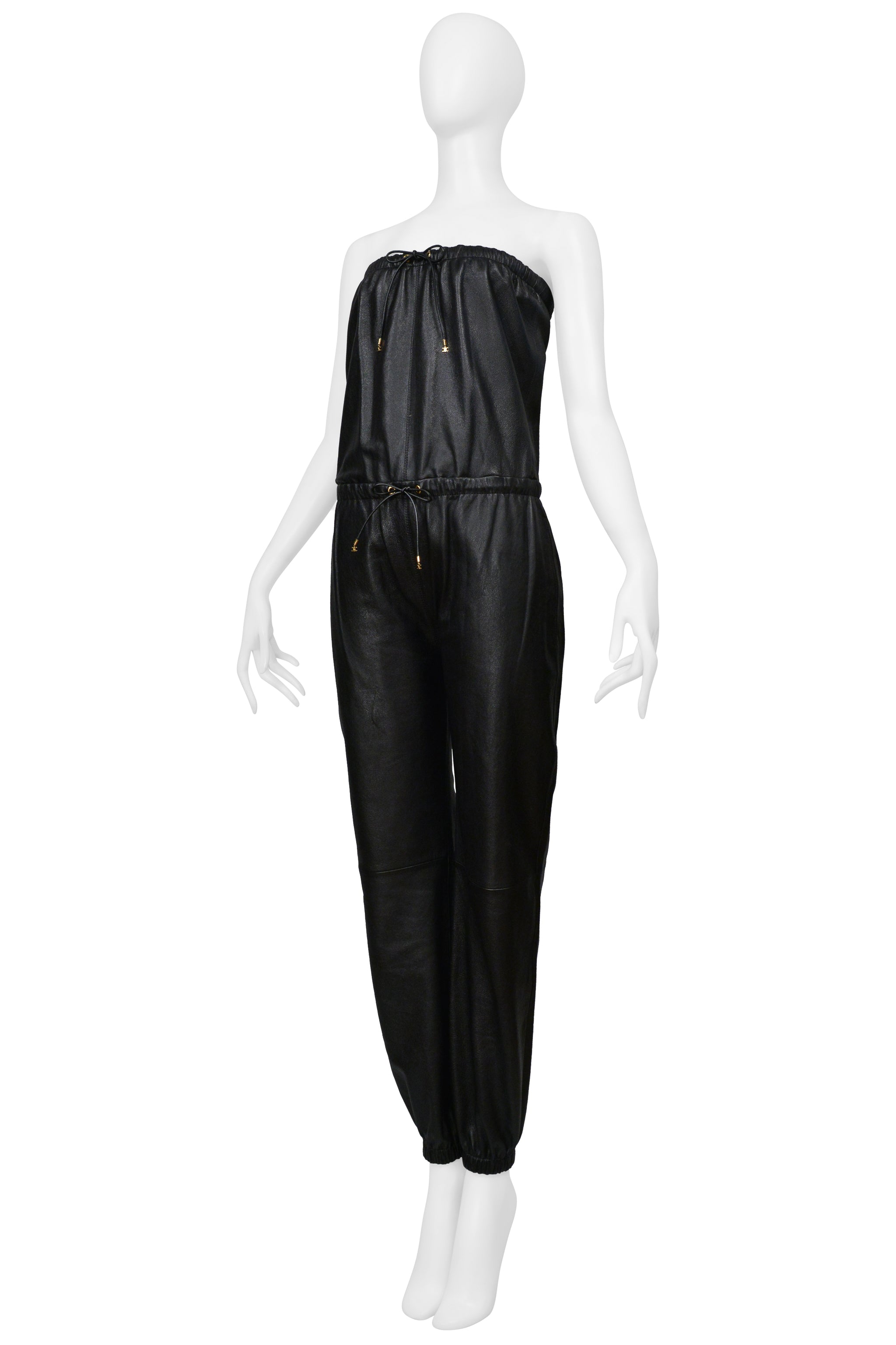 CELINE BY HEDI SLIMANE BLACK LEATHER STRAPLESS JUMPSUIT WITH GOLD DETAILING 2021