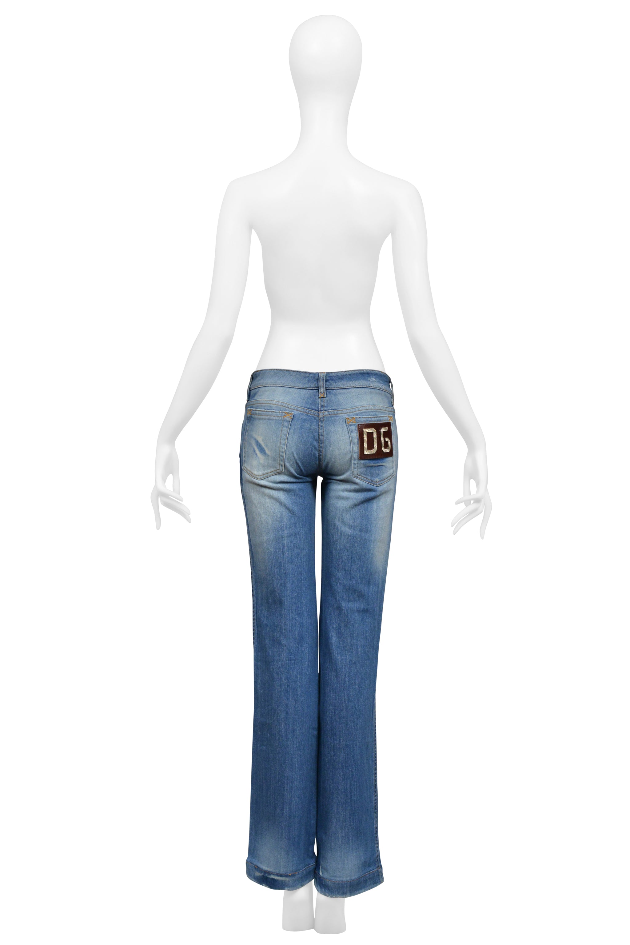 DOLCE & GABBANA DISTRESSED BLUE DENIM JEANS WITH RHINESTONE D&G BADGE