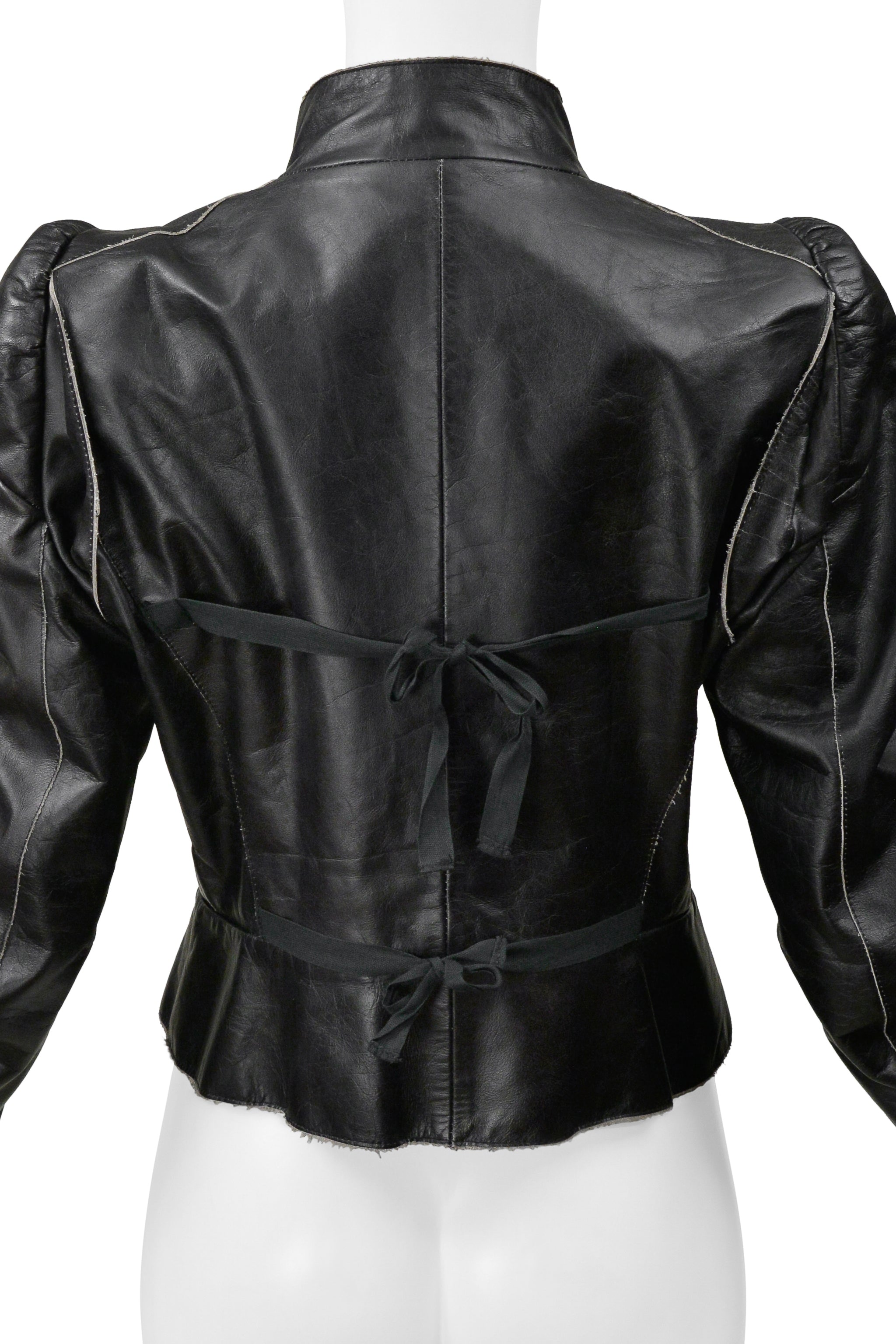 MAISON MARTIN MARGIELA BLACK DISTRESSED LEATHER JACKET WITH LARGE BUCKLE AND TIES 1990S