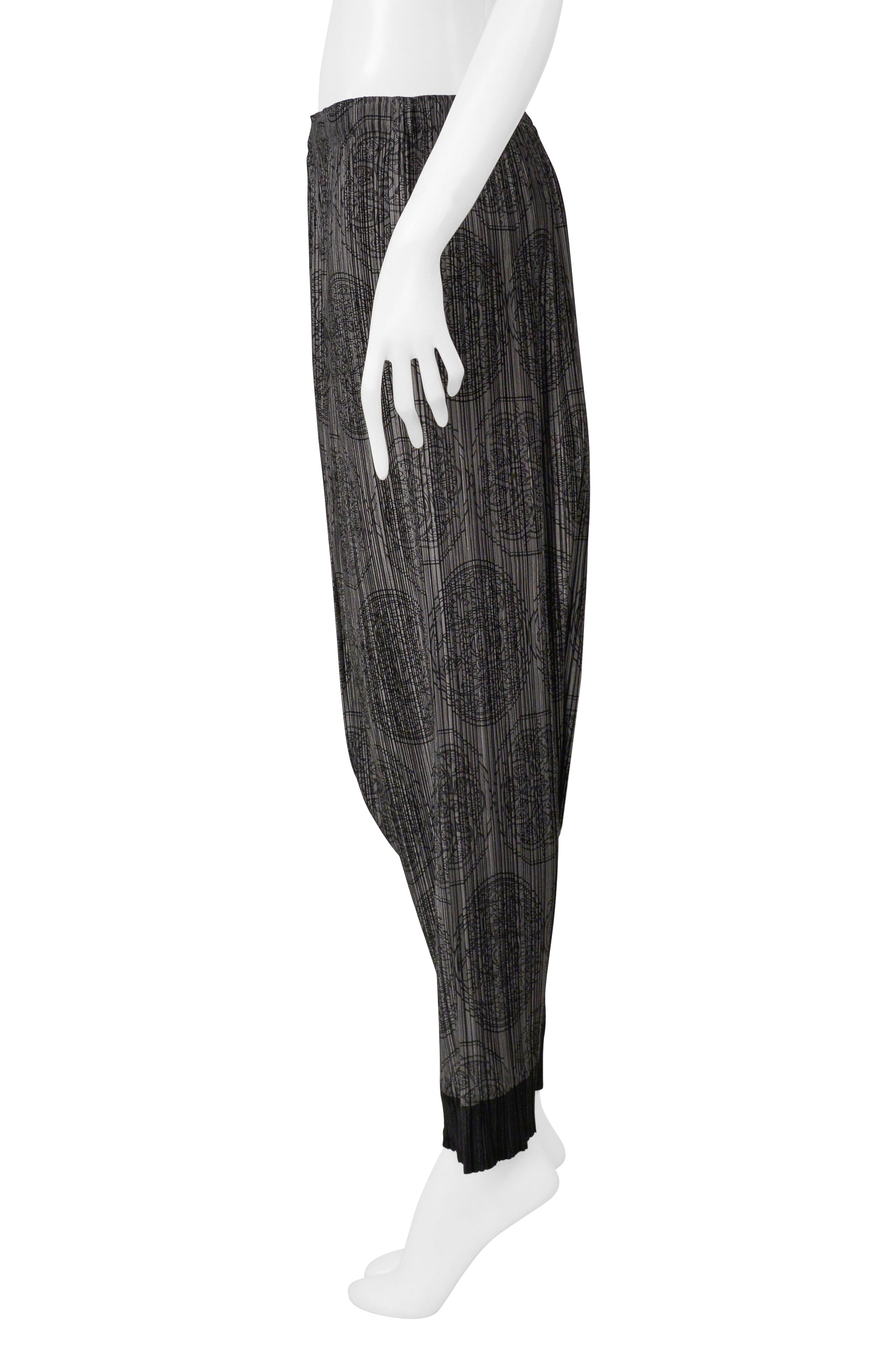 ISSEY MIYAKE PLEATS PLEASE GREY HAREM PANTS WITH MEDALLION PRINT AND BLACK CUFFS