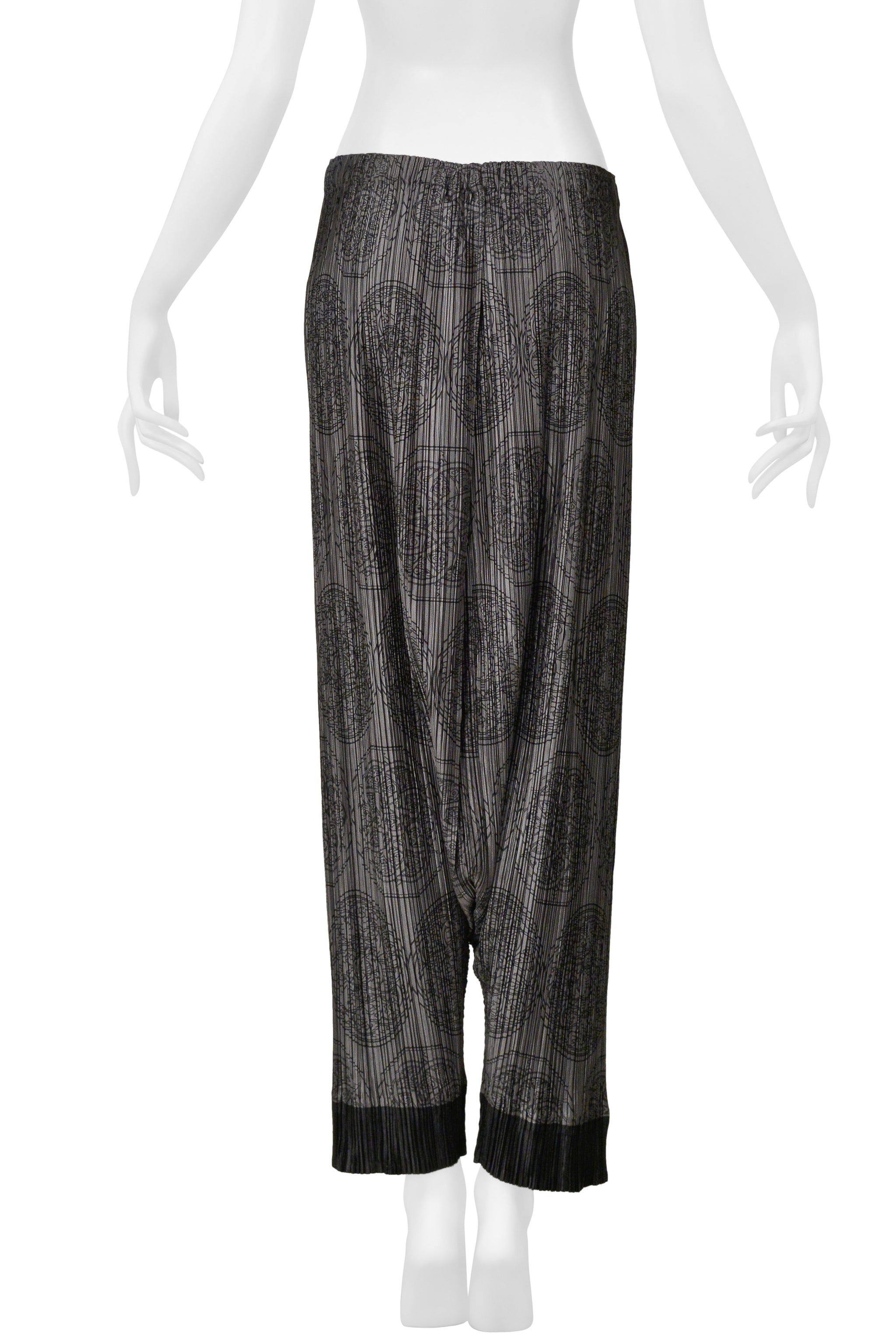 ISSEY MIYAKE PLEATS PLEASE GREY HAREM PANTS WITH MEDALLION PRINT AND BLACK CUFFS