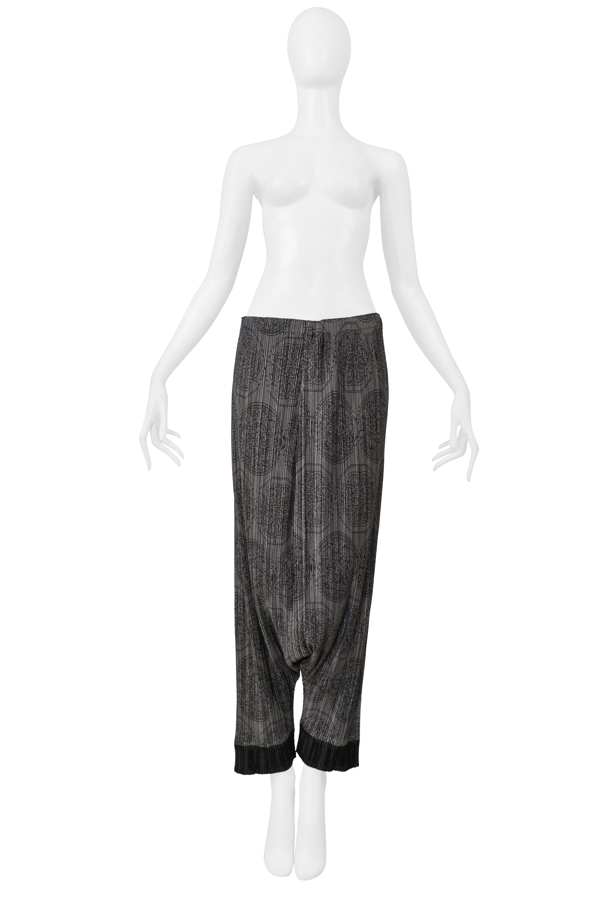 ISSEY MIYAKE PLEATS PLEASE GREY HAREM PANTS WITH MEDALLION PRINT AND BLACK CUFFS