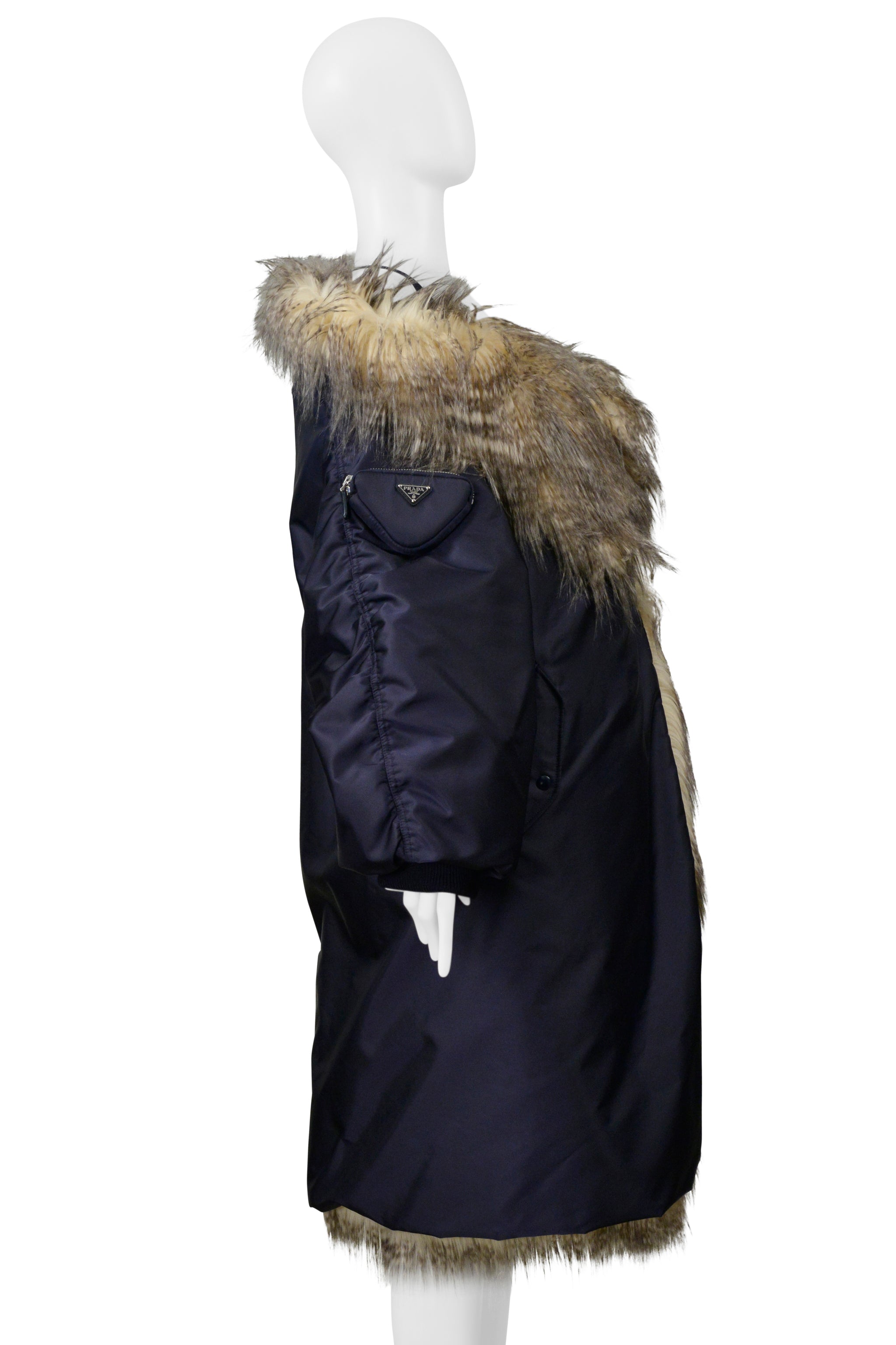 PRADA BY RAF SIMONS BLUE BOMBER COAT WITH FAUX FUR AND HOOD 2021