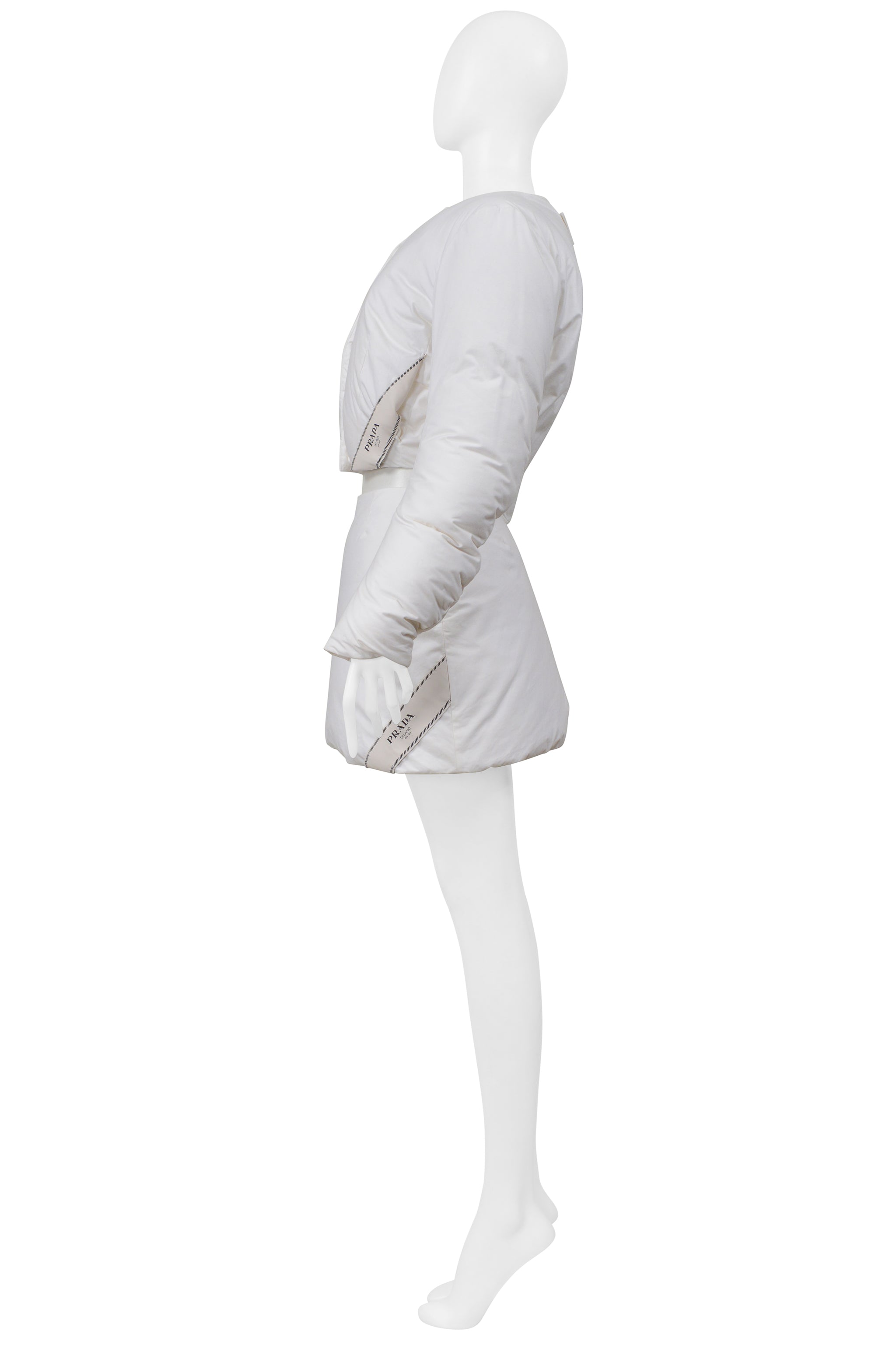 PRADA BY RAF SIMONS WHITE COTTON PADDED JACKET AND MINI SKIRT 2023