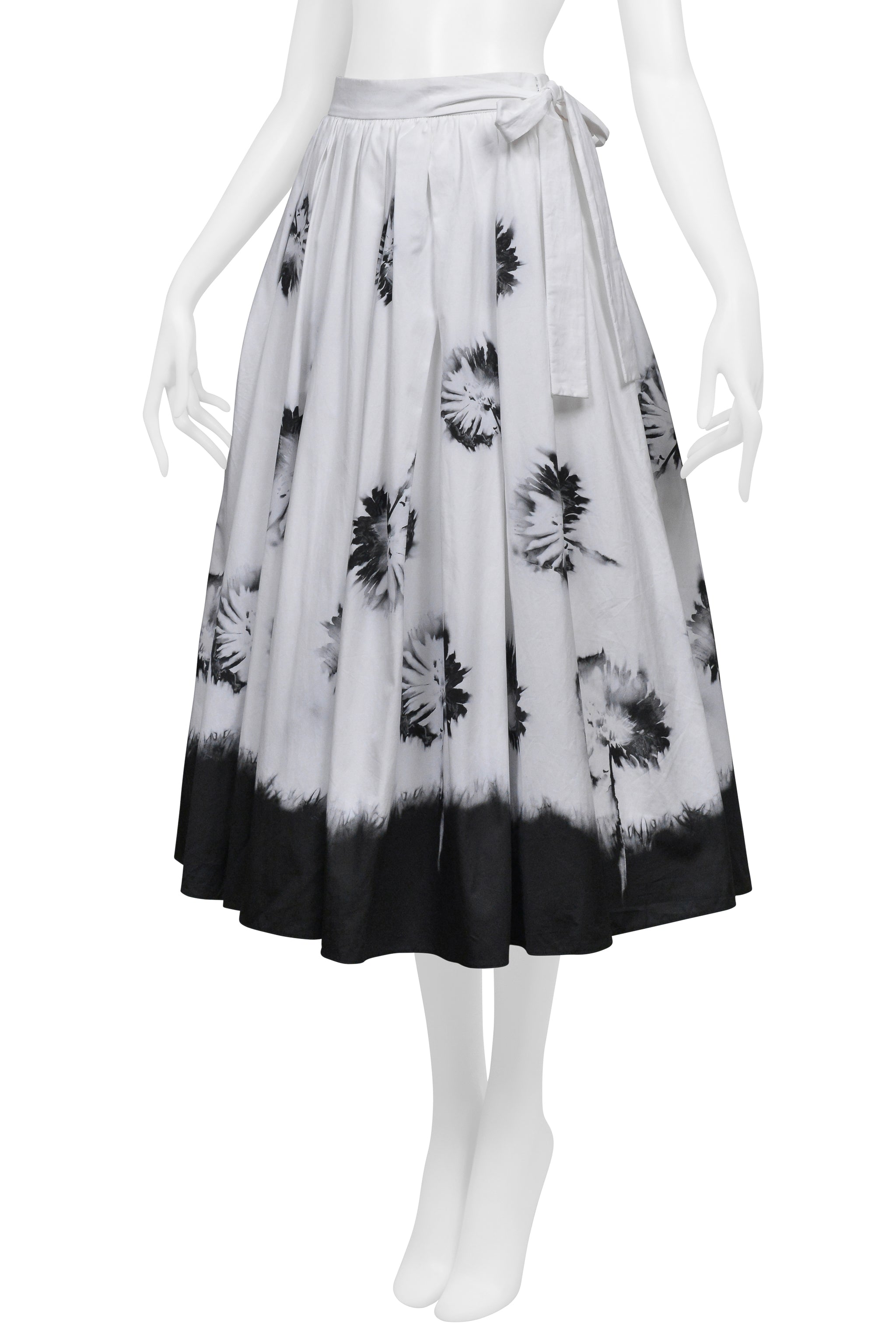 PRADA WHITE SKIRT WITH BLACK FLOWERS AND DIPPED HEM