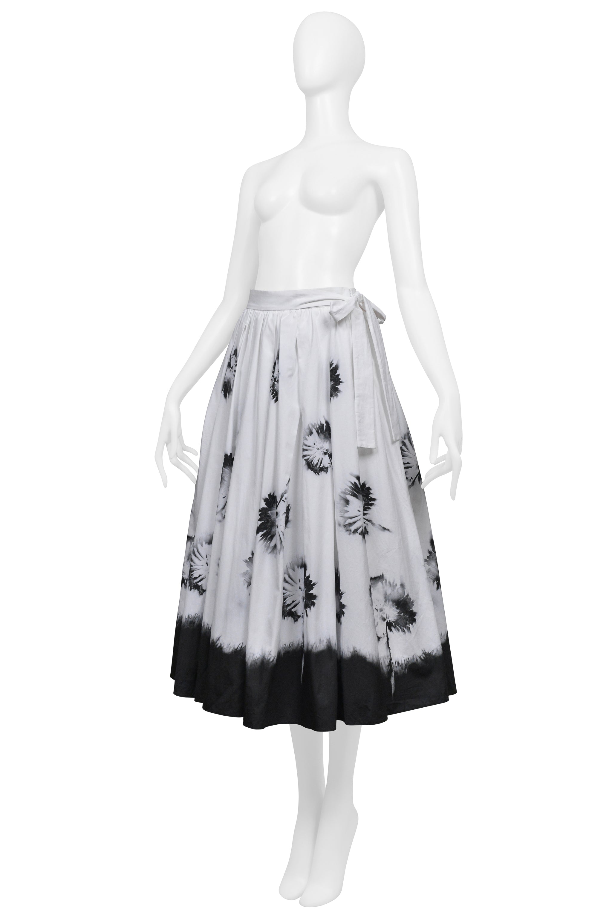 PRADA WHITE SKIRT WITH BLACK FLOWERS AND DIPPED HEM
