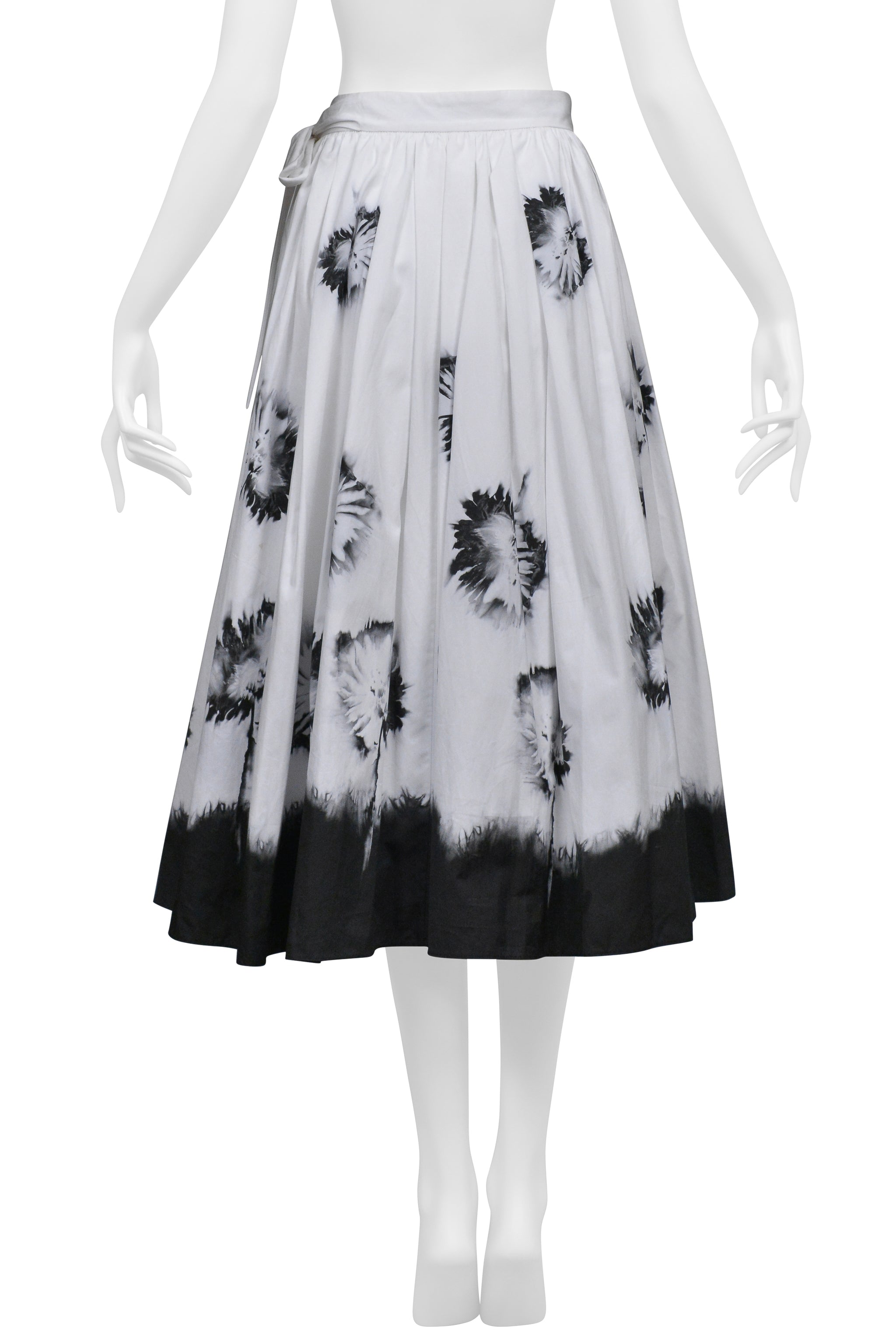 PRADA WHITE SKIRT WITH BLACK FLOWERS AND DIPPED HEM