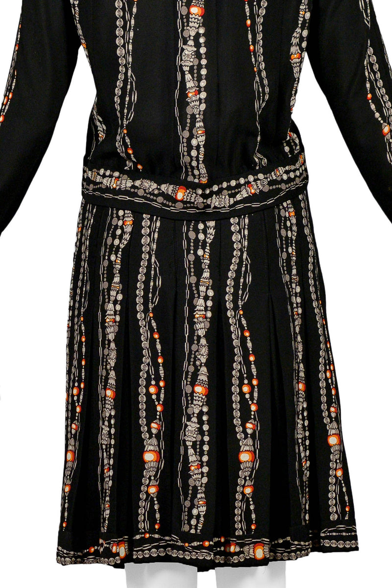 CHANEL BLACK SKIRT SUIT WITH ICONIC BEAD & PEARL NECKLACE PRINT