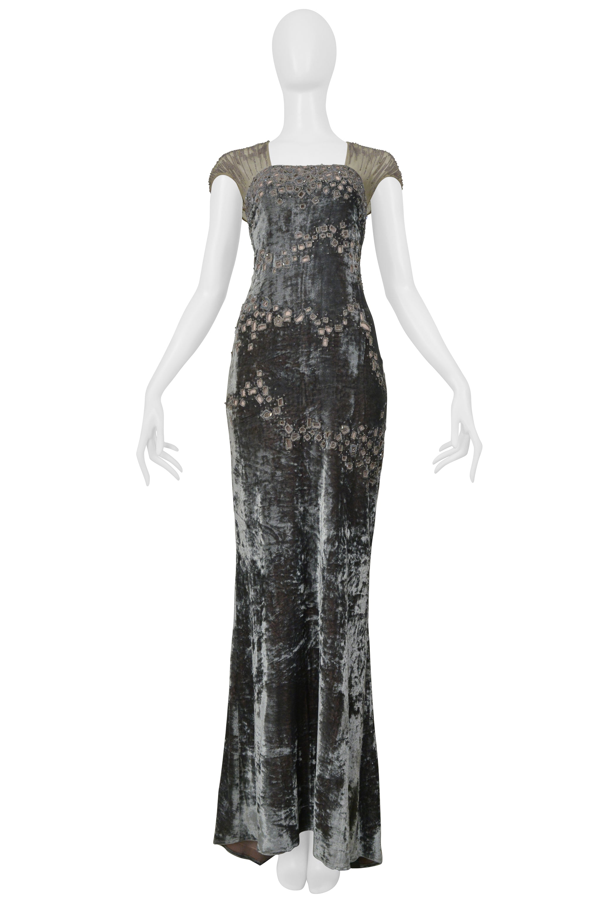 BADGLEY MISCHKA SILVER EVENING GOWN WITH MESH YOKE, BEADING, AND SQUARE CUTOUTS