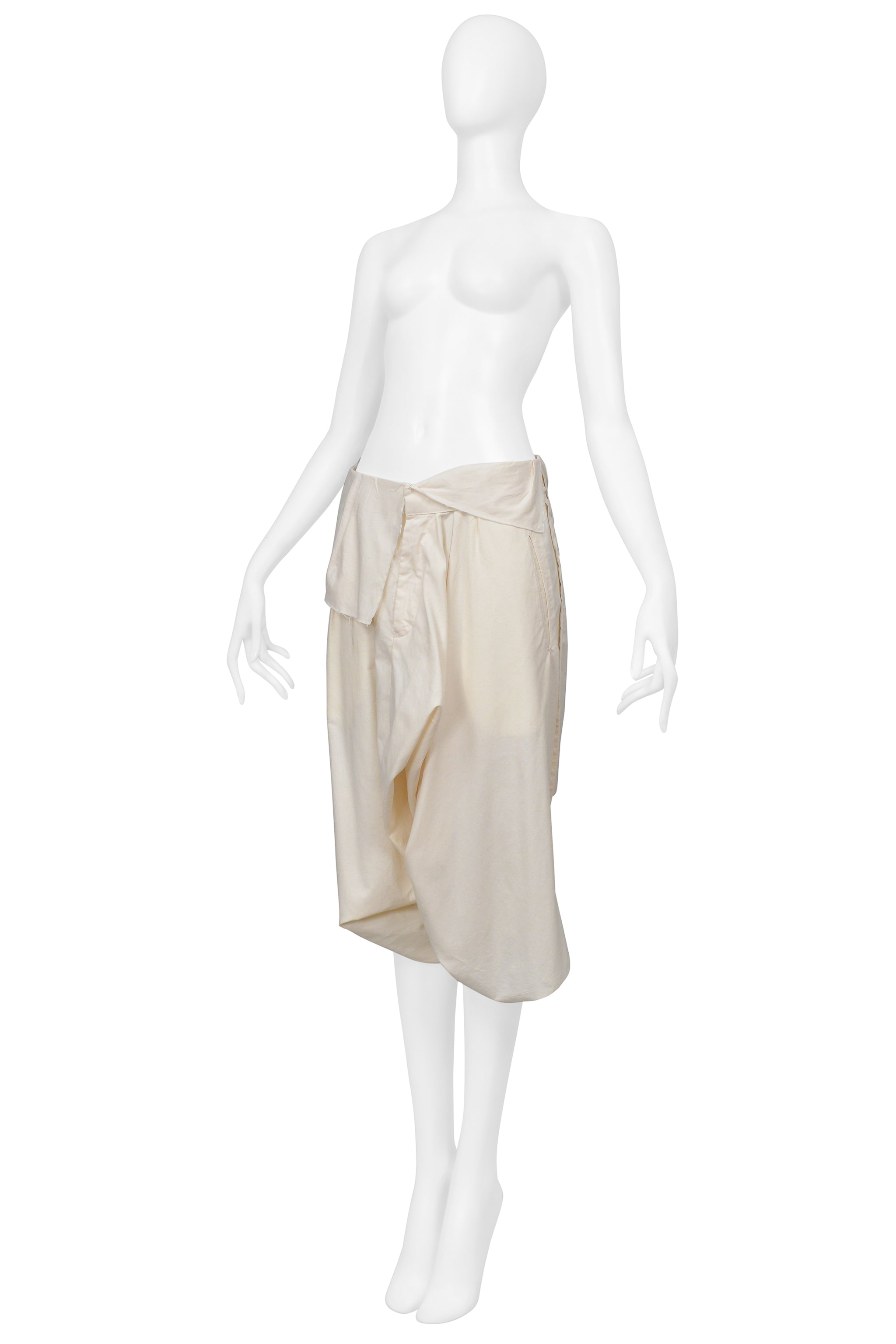 COMME DES GARÇONS CREAM OVERSIZED DRAPED SHORTS