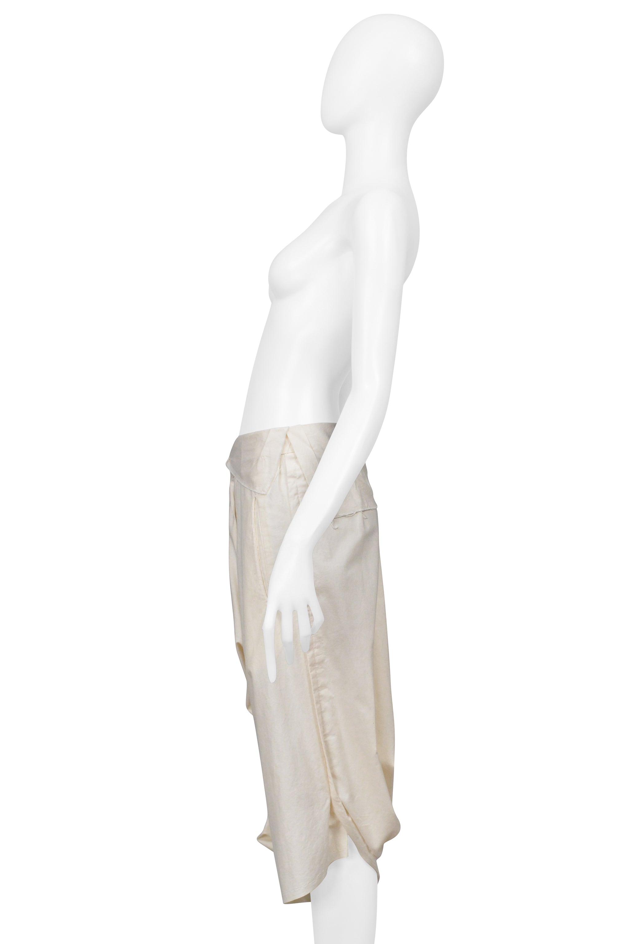 COMME DES GARÇONS CREAM OVERSIZED DRAPED SHORTS