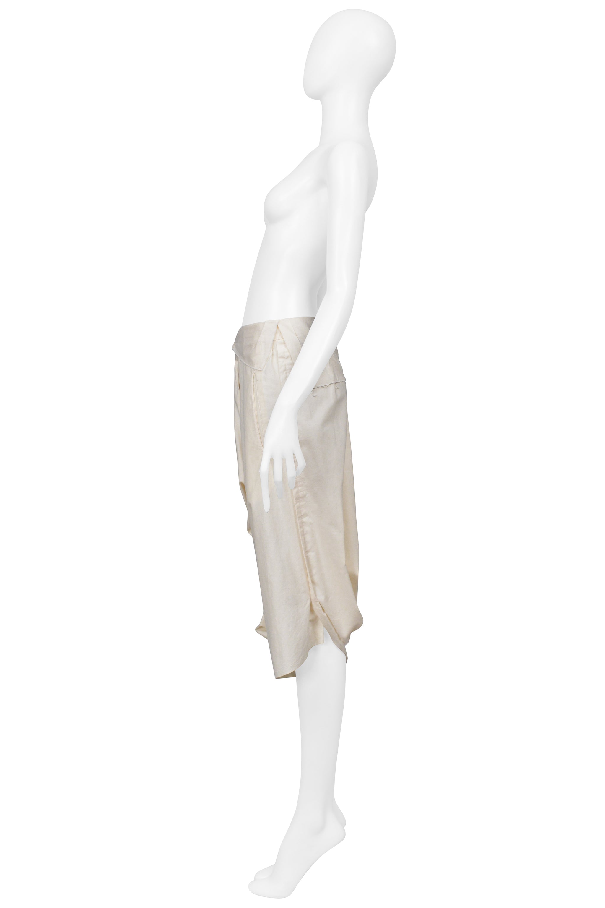 COMME DES GARÇONS CREAM OVERSIZED DRAPED SHORTS