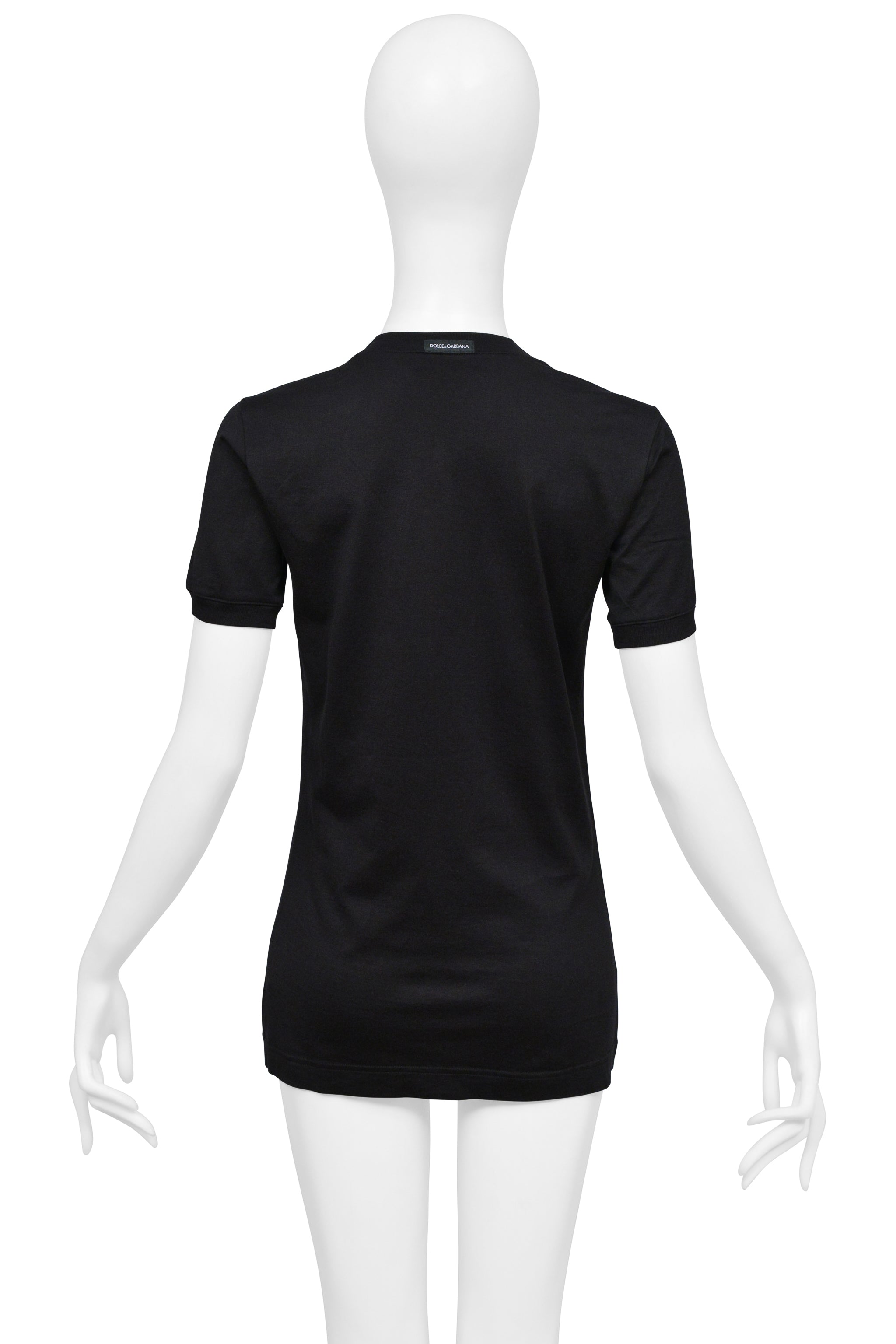 DOLCE & GABBANA BLACK T-SHIRT WITH ATTACHED SATIN BOW AND CHANEL-STYLE BIJOUX CROSS