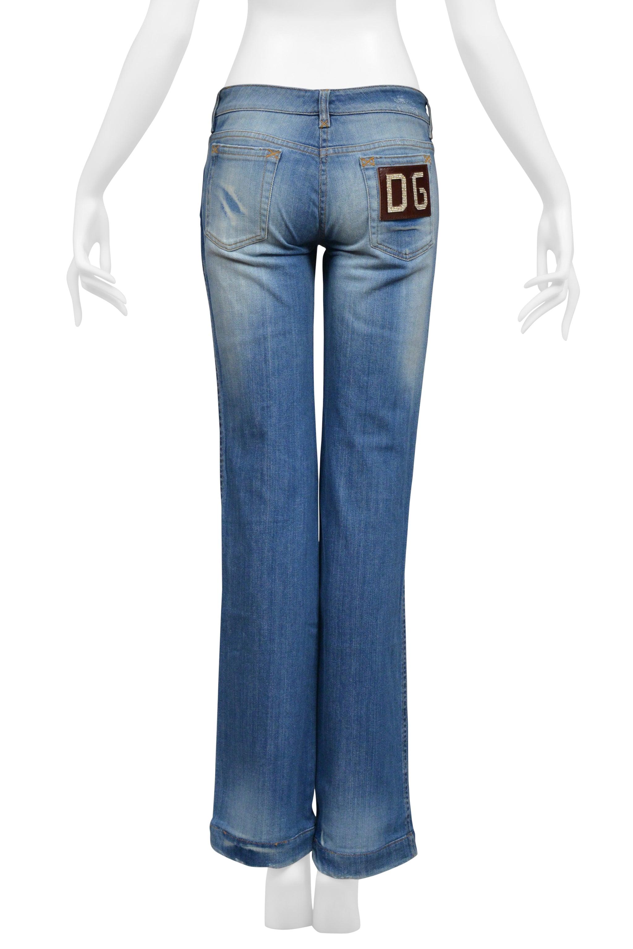 DOLCE & GABBANA DISTRESSED BLUE DENIM JEANS WITH RHINESTONE D&G BADGE