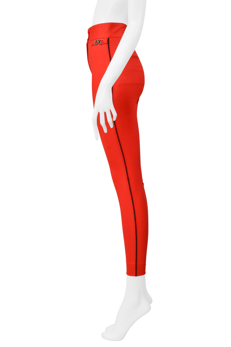 DOLCE & GABBANA RED SKINNY PANTS WITH BLACK PIPING AND LOGO
