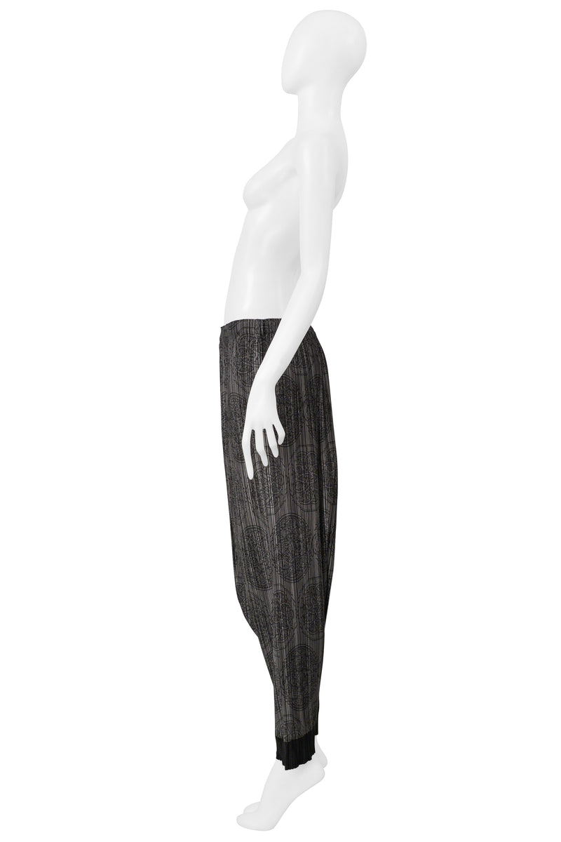 ISSEY MIYAKE PLEATS PLEASE GREY HAREM PANTS WITH MEDALLION PRINT AND BLACK CUFFS