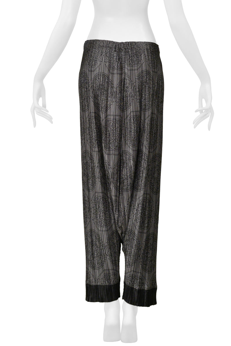 ISSEY MIYAKE PLEATS PLEASE GREY HAREM PANTS WITH MEDALLION PRINT AND BLACK CUFFS