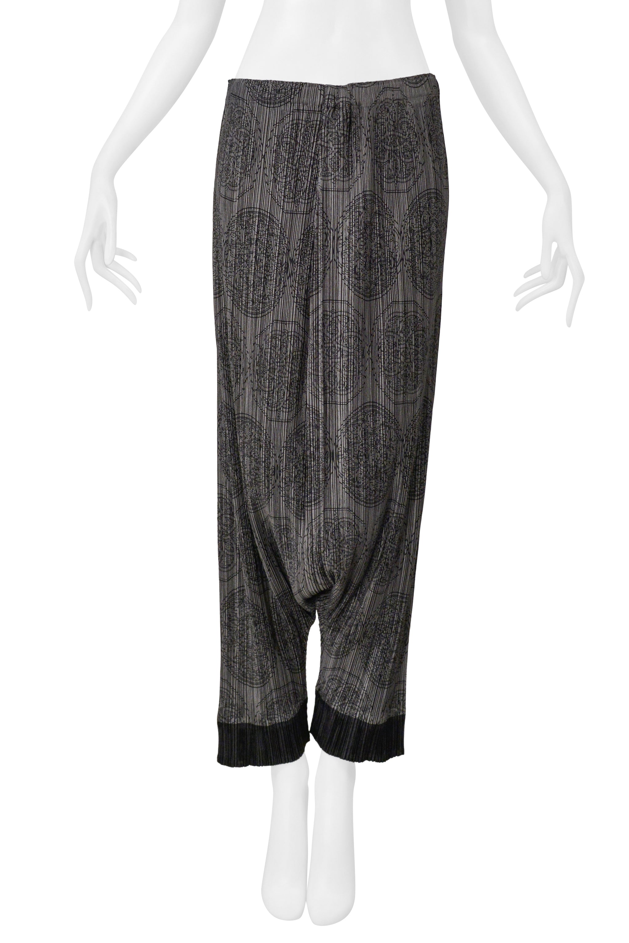 ISSEY MIYAKE PLEATS PLEASE GREY HAREM PANTS WITH MEDALLION PRINT AND BLACK CUFFS