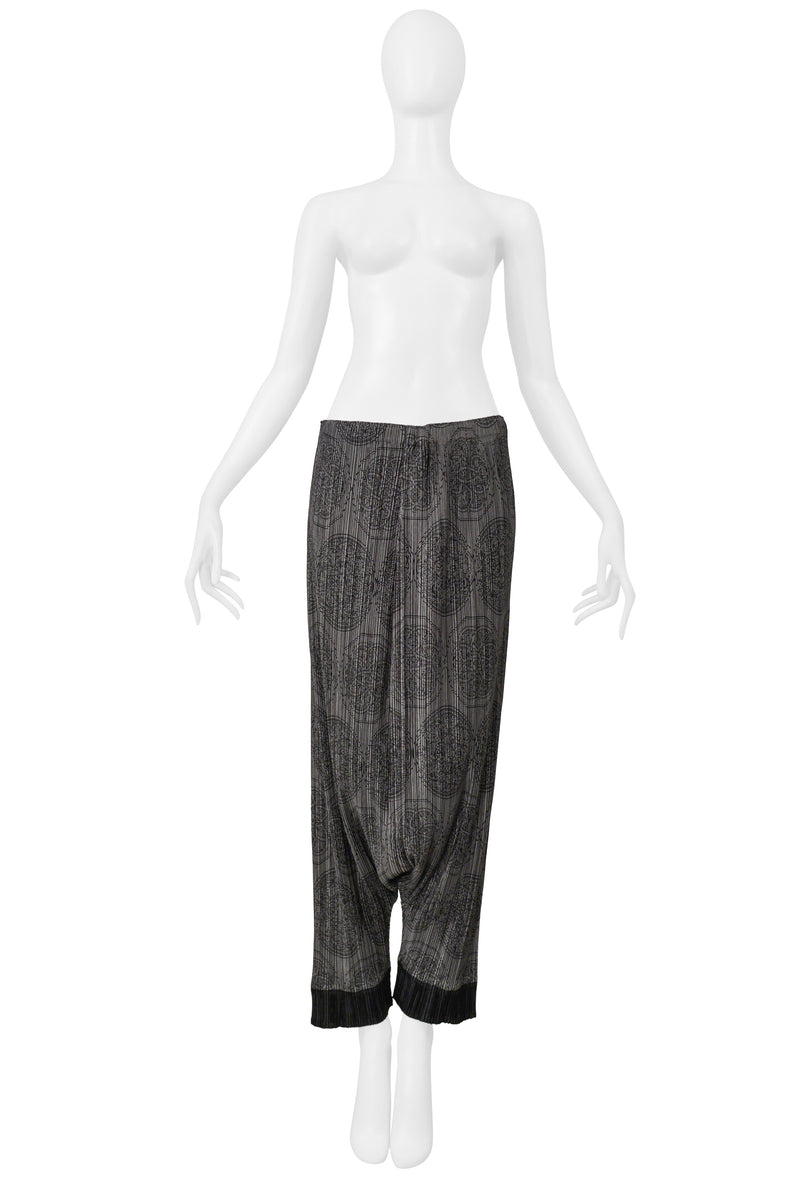 ISSEY MIYAKE PLEATS PLEASE GREY HAREM PANTS WITH MEDALLION PRINT AND BLACK CUFFS