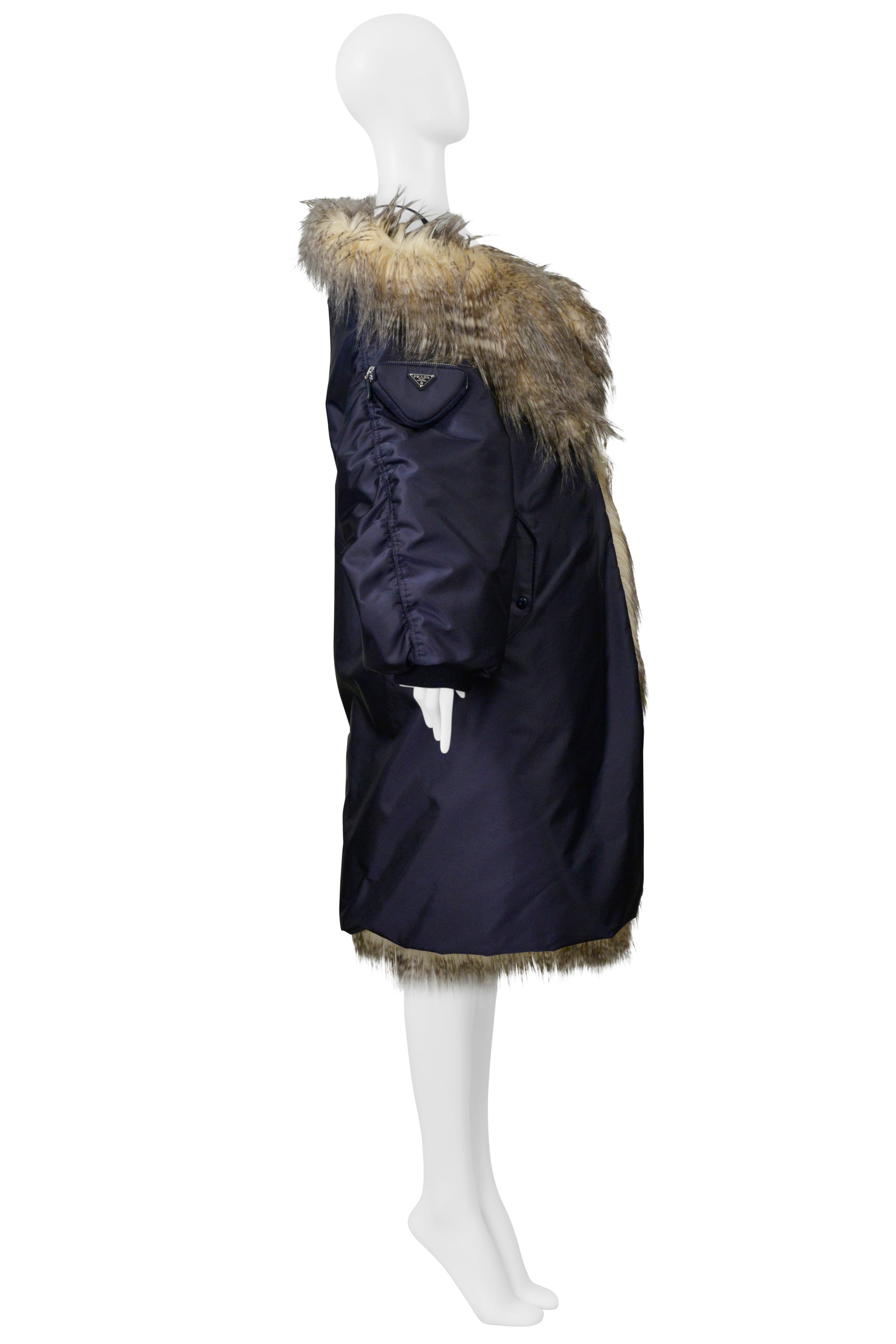 PRADA BY RAF SIMONS BLUE BOMBER COAT WITH FAUX FUR AND HOOD 2021