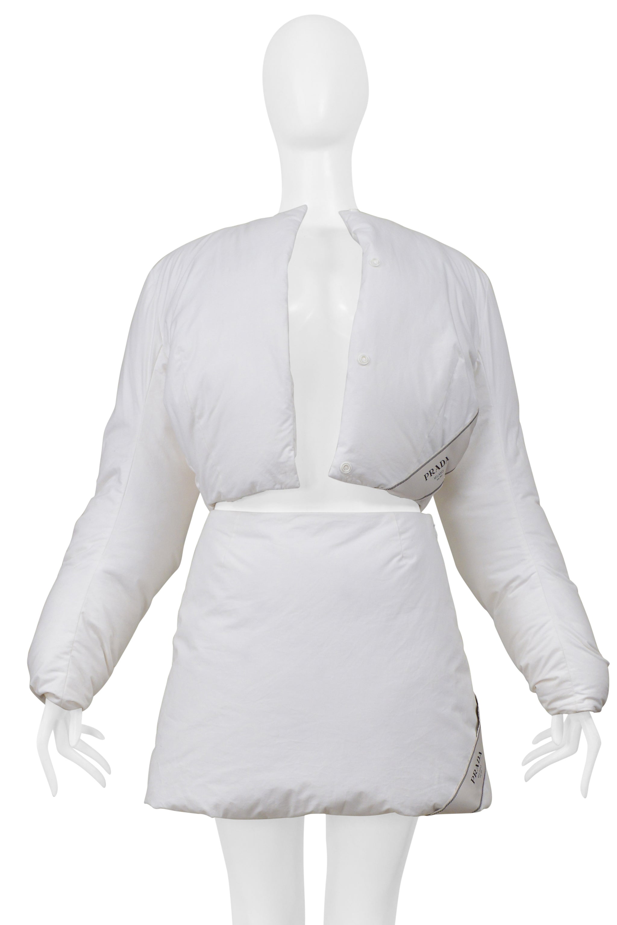 PRADA BY RAF SIMONS WHITE COTTON PADDED JACKET AND MINI SKIRT 2023