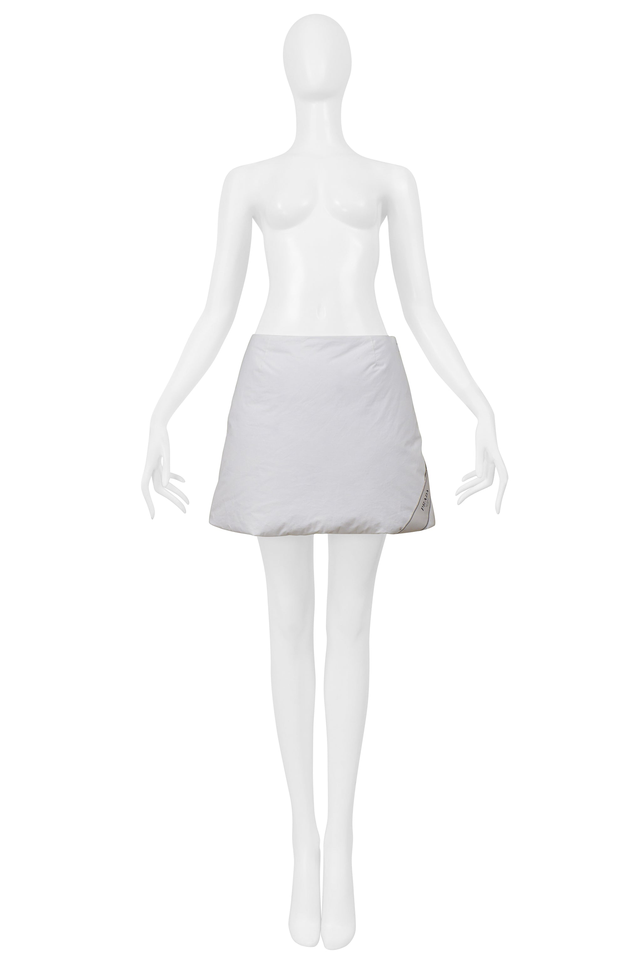 PRADA BY RAF SIMONS WHITE COTTON PADDED JACKET AND MINI SKIRT 2023