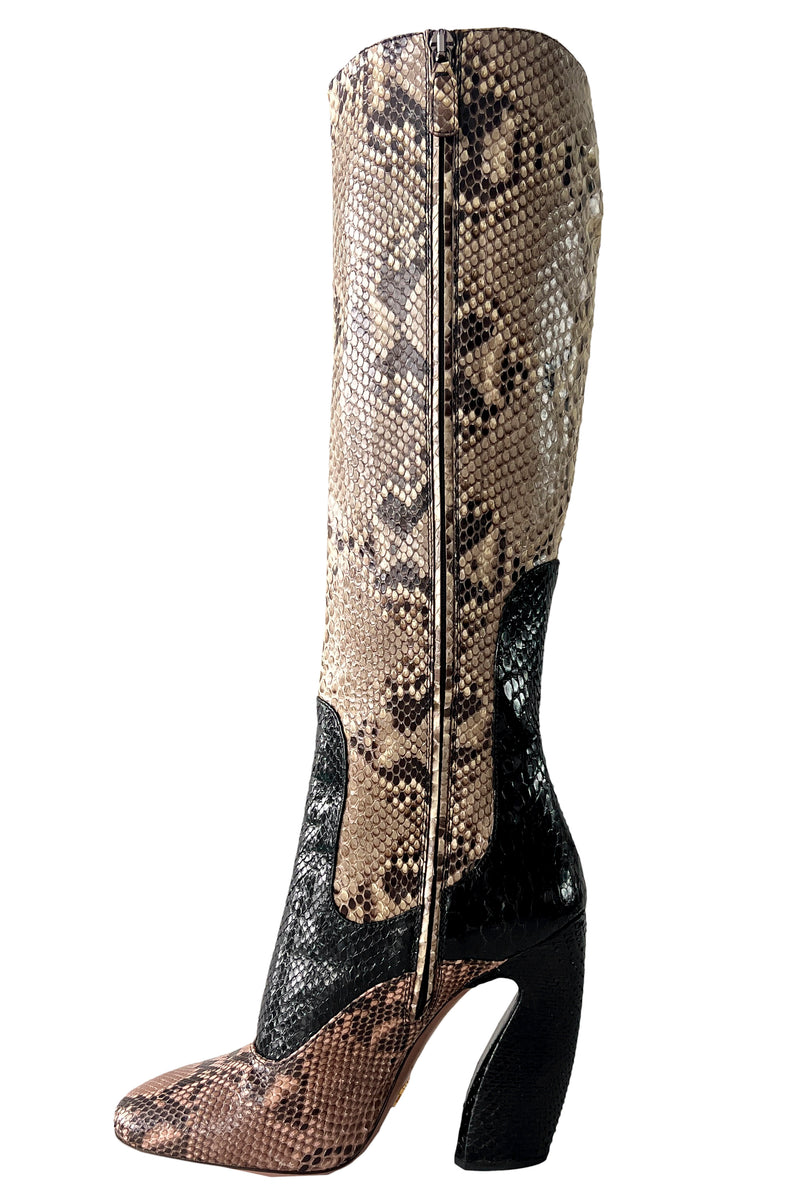 PRADA BLACK, PINK, AND NATURAL SNAKESKIN BOOTS 2011