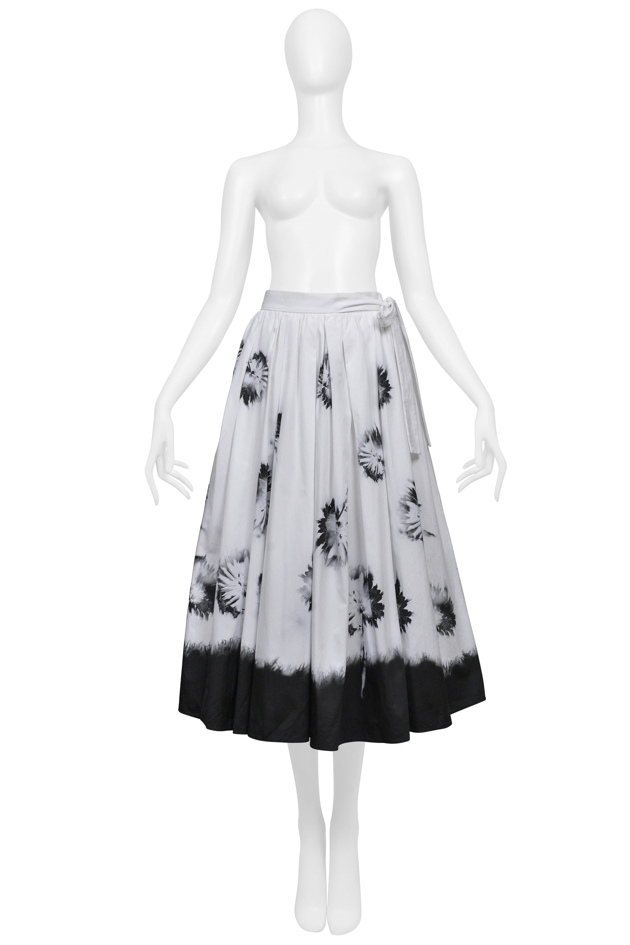 PRADA WHITE SKIRT WITH BLACK FLOWERS AND DIPPED HEM