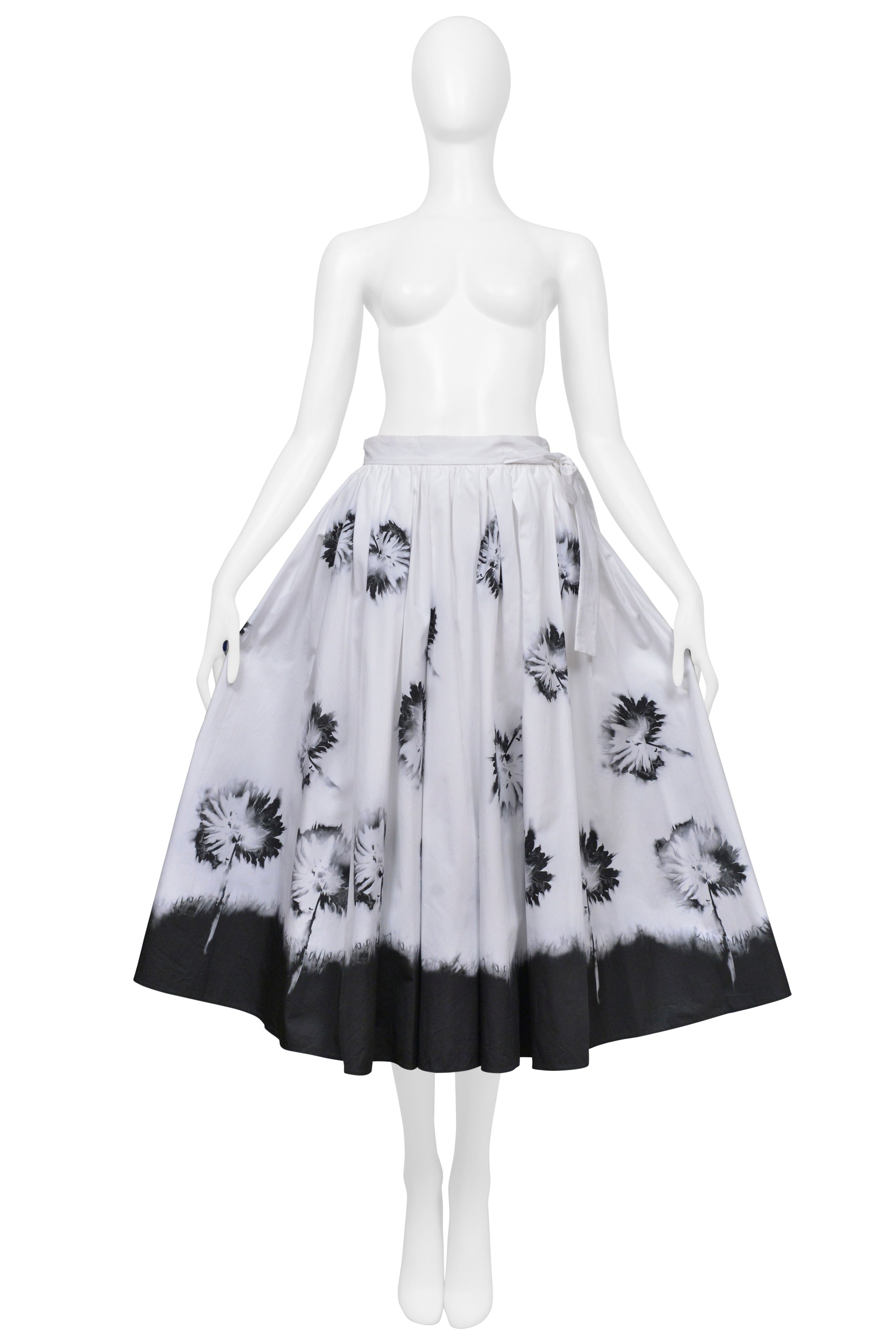 PRADA WHITE SKIRT WITH BLACK FLOWERS AND DIPPED HEM