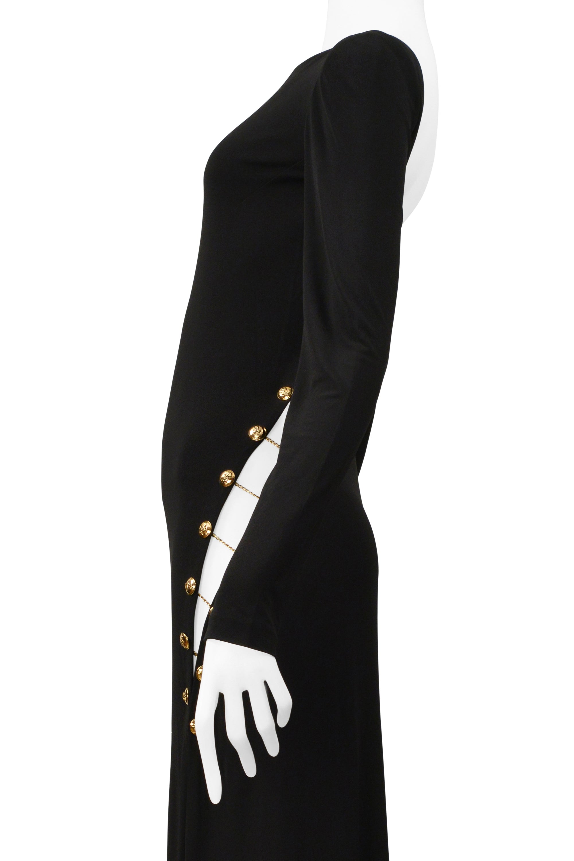 PUCCI BLACK JERSEY EVENING GOWN WITH CUTOUT AND GOLD CHAINS