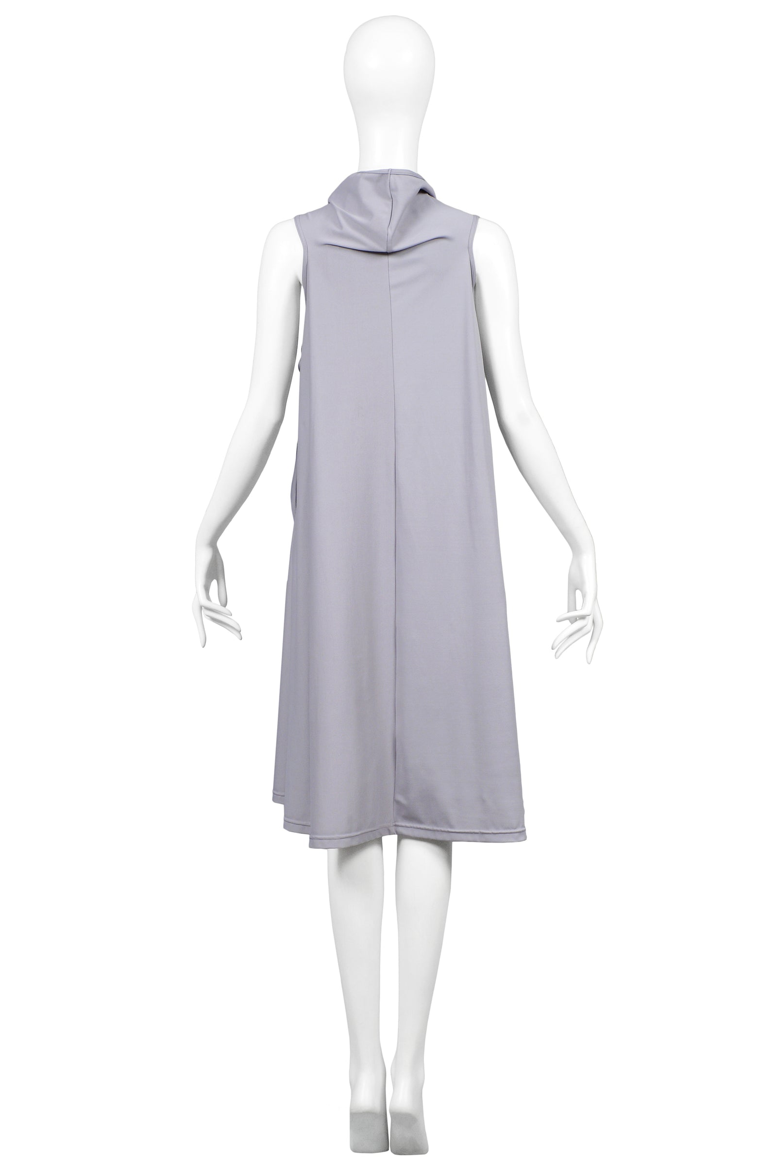 Comme des Garçons black dress with scalloped edges and wider